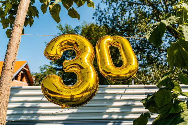 30th birthday balloon sign outdoors - garden decoration stock pictures, royalty-free photos & images