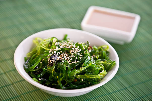 a bowl of wakame seaweed salad - food stock pictures, royalty-free photos & images