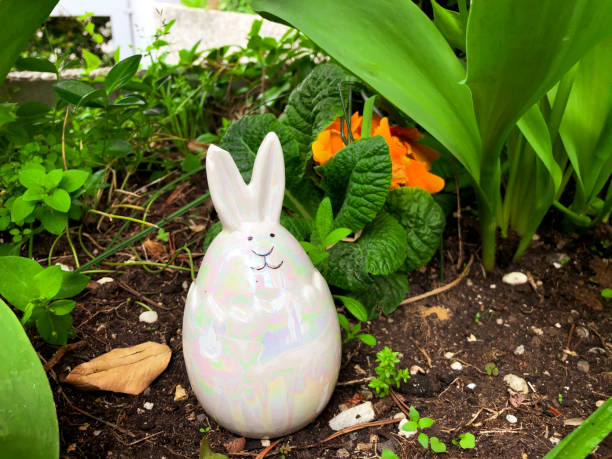 a bunny decoration in the garden - garden decoration stock pictures, royalty-free photos & images
