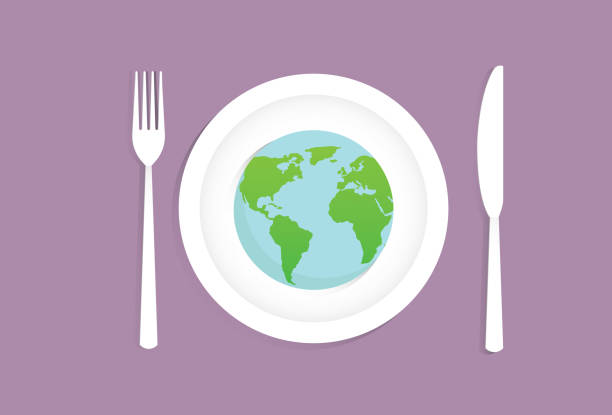 a globe on a dish with fork and a knife - food stock illustrations