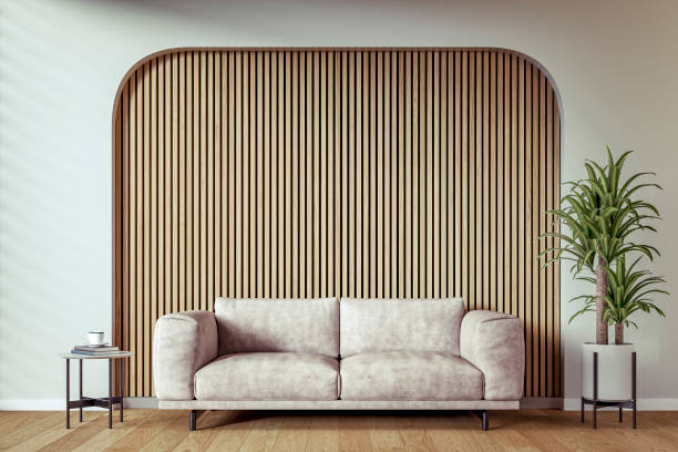 a modern, minimalist living room with a warm cream leather sofa set against a wooden slat accent wall with copy space, surrounded by an arched cotton white background and decoration - home decoration stock pictures, royalty-f
