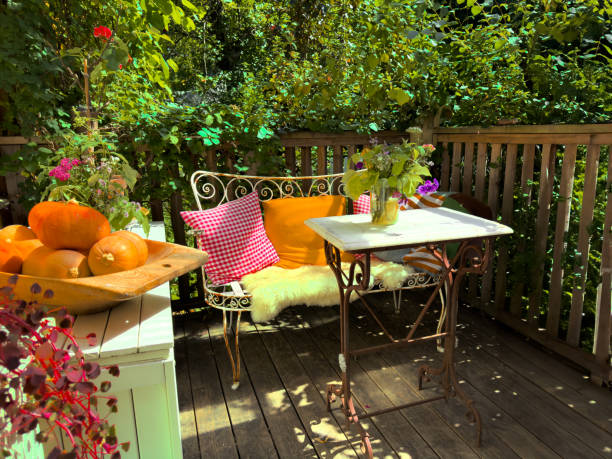 a nice place to sit and enjoy a quiet moment a lovely summer day - garden decoration stockfoto's en -beelden