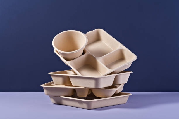a pile of disposable paper tv dinner tray - junk food stock pictures, royalty-free photos & images