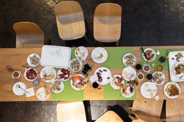 abandoned buffet dinner table after eating - food stock pictures, royalty-free photos & images