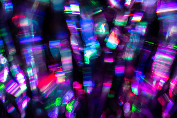 abstract colorful surreal festive night city lights bokeh on black background - concert stock pictures, royalty-free photos & images