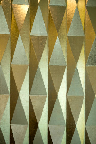 abstract geometric wall with metallic finish - home decoration stock pictures, royalty-free photos & images