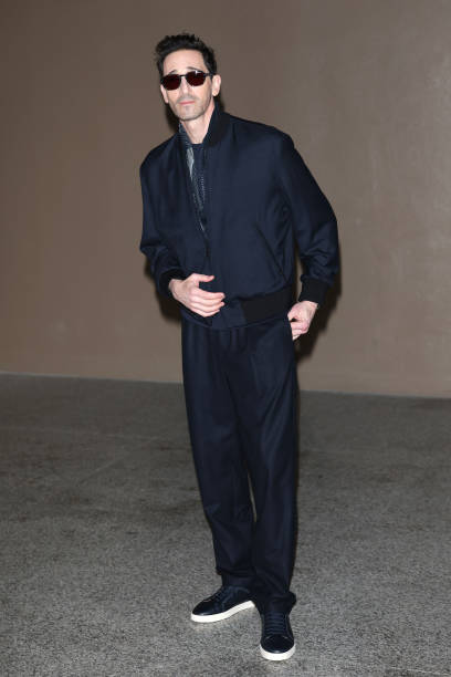 Adrien Brody arrives at the Giorgio Armani fashion show during the Milan Menswear Fall/Winter 2025 - 2026 Fashion Week on January 20, 2025 in Milan,...