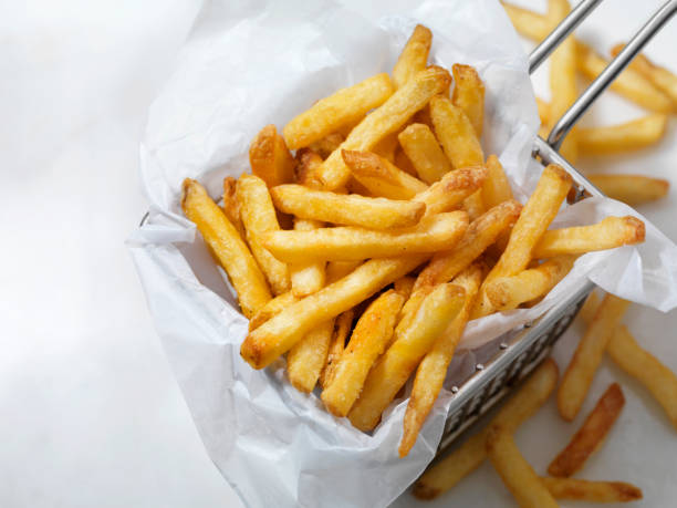 air fried, crispy french fries - junk food stock pictures, royalty-free photos & images
