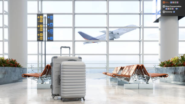 airport waiting area with luggages, empty seats and blurred background - travel stock pictures, royalty-free photos & images