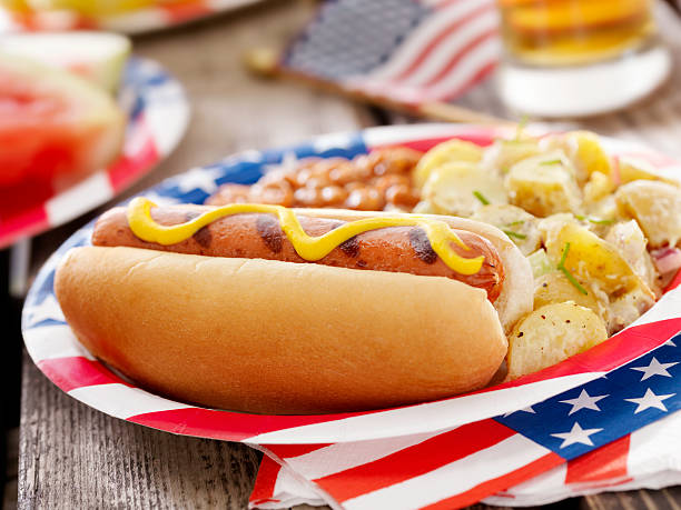 all american hotdog and a beer - garden decoration stock pictures, royalty-free photos & images