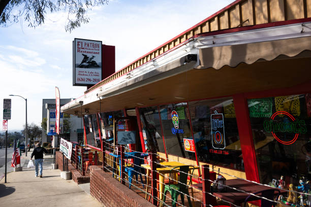 Altadena, CA A customer leaves El Patron with a take out order as the Mexican restaurant in Altadena reopens on Monday, March 17, 2025 after being...