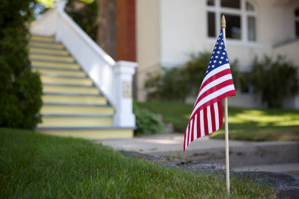 american flag in front of house - garden decoration stock pictures, royalty-free photos & images
