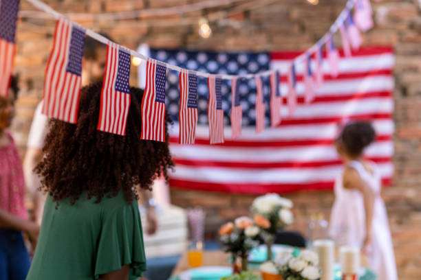 american flag pennant at backyard during celebration of national holiday - home decoration stock pictures, royalty-free photos & images