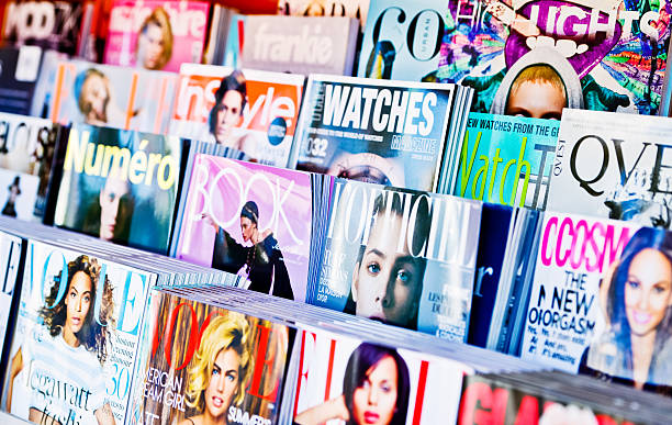 american magazines displayed for sale on newsstand - fashion stock pictures, royalty-free photos & images