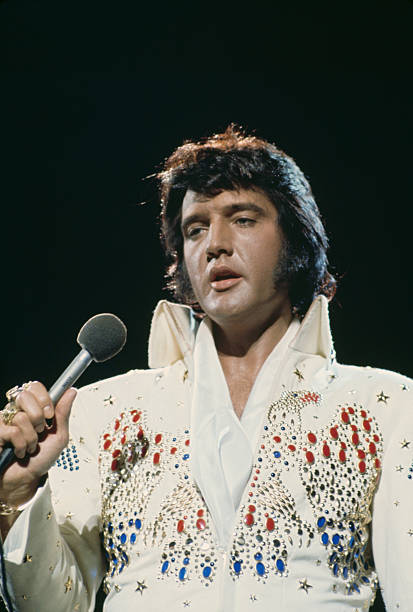 American singer Elvis Presley performing in the 'Aloha from Hawaii Via Satellite', televised concert at the Honolulu International Center, Hawaii,...