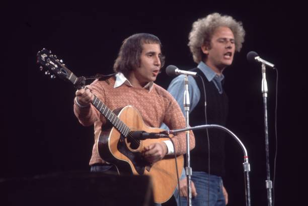 American singers and musicians Paul Simon and Art Garfunkel performing at 'Together with McGovern,' a fundraising concert for the presidential...