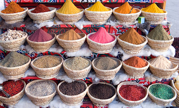 an egyptian spice market with baskets full of spice - food stock pictures, royalty-free photos & images