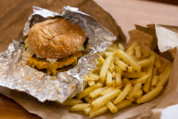 An order of a burger and french fries at the first outlet of US burger restaurant chain Five Guys in the Gangnam District of Seoul, South Korea, on...
