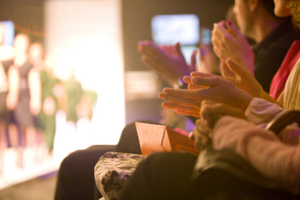 applauding - fashion stock pictures, royalty-free photos & images