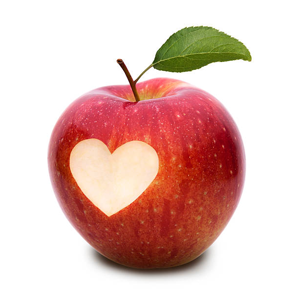 apple with heart symbol and leaf - food stock pictures, royalty-free photos & images