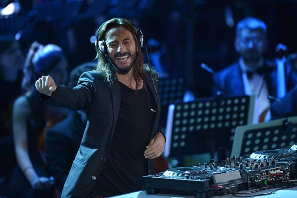 Artists Bob Sinclar performs during the annual Vatican's Christmas concert on December 13, 2014 at the Vatican's Conciliation auditorium in Rome. AFP...