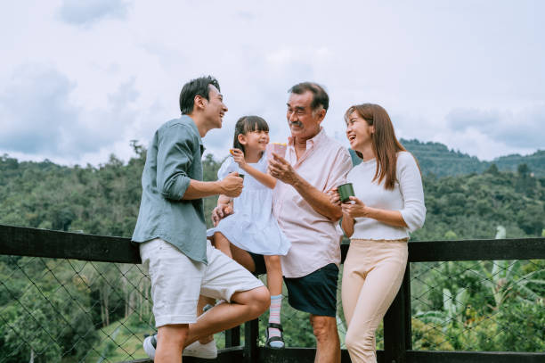 asian chinese family having great time at the resort hotel - travel stock pictures, royalty-free photos & images