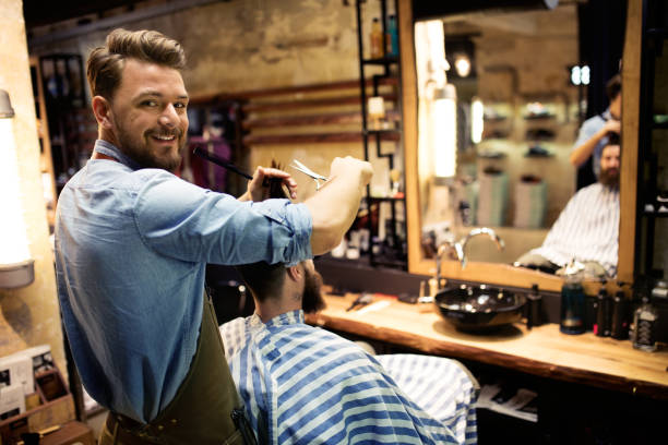 at barber shop - hairstyle stock pictures, royalty-free photos & images