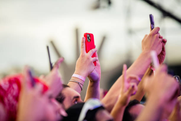 Audience with cell phones and smartphones during 'Ensaios de Carnaval da Anitta' show at Memorial da America Latina on February 4, 2024 in Sao Paulo,...
