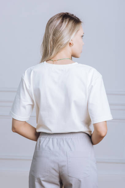 back view woman in white t-shirt and pants portrait close up catalog of clothes for sale - fashion stock pictures, royalty-free photos & images