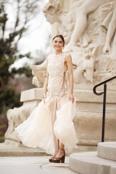 Bambi Noorthwood wears beige dress and brown leather shooe outside the Zimmermann fashion show during the Womenswear Fall/Winter 2025/2026 as part of...