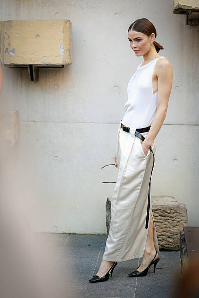 Bambi Northwood-Blyth wearing Bianca Spender white top, beige skirt and black belt during Australian Fashion Week 2025 on May 14, 2025 in Sydney,...