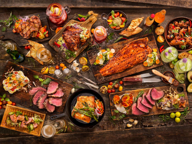 bbq feast - food stock pictures, royalty-free photos & images