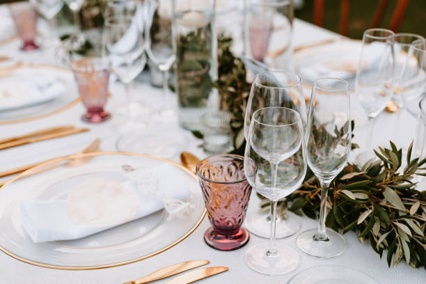 beautiful boho wedding table decoration with olive branches and rose drink glasses in majorca - home decoration stock pictures, royalty-free photos & images