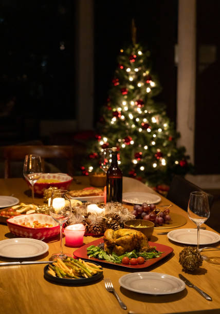 beautiful christmas dinner served on the table - home decoration stock pictures, royalty-free photos & images