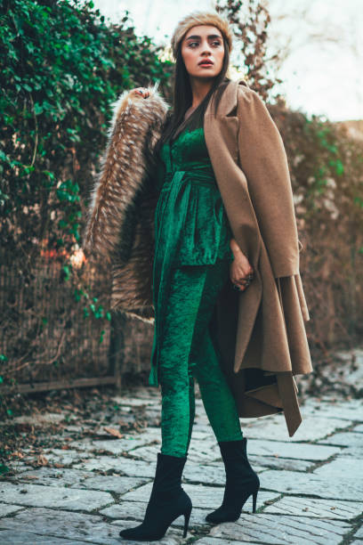 beautiful fashion woman posing on the street - fashion stock pictures, royalty-free photos & images