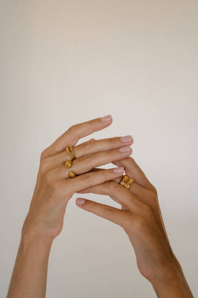 beautiful female hands with rings - fashion stock pictures, royalty-free photos & images
