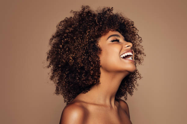 beautiful girl with curly hairstyle - hairstyle stock pictures, royalty-free photos & images