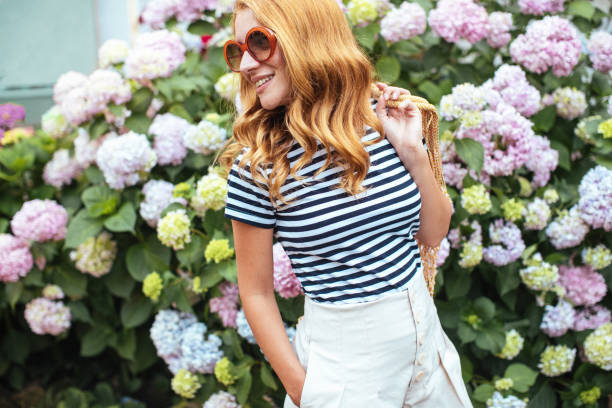 beautiful girl with hydrangea flowers - fashion stock pictures, royalty-free photos & images