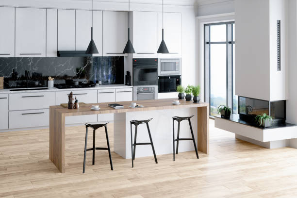 beautiful kitchen in luxury home with island - home decoration stock pictures, royalty-free photos & images