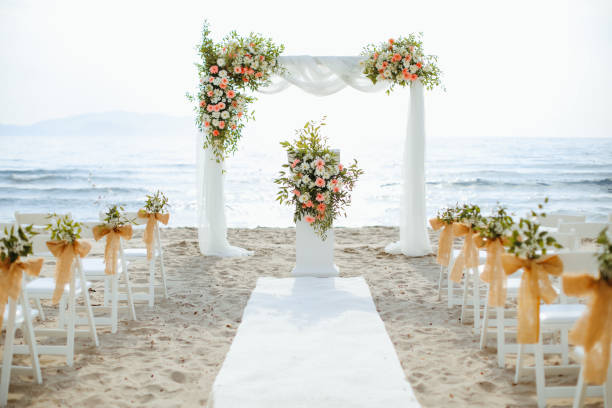 beautiful wedding arch on the beach - garden decoration stock pictures, royalty-free photos & images