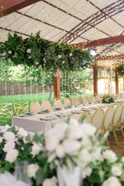 beautiful wedding reception at the stylishly decorated terrace - garden decoration stock pictures, royalty-free photos & images