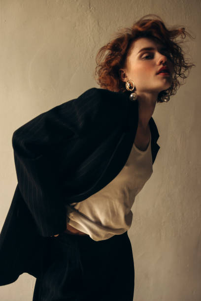 beautiful woman in formal suit - fashion stock pictures, royalty-free photos & images