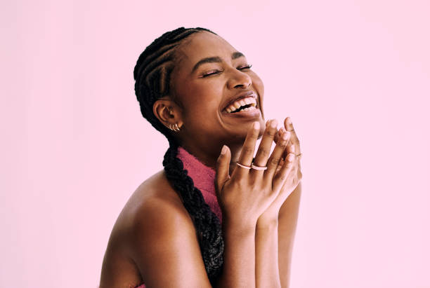 beauty shot of beautiful black woman in monochromatic pink. stock photo, copy space - hairstyle stock pictures, royalty-free photos & images