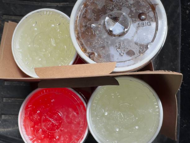 beverage cups from a fast food drive thru - junk food stock pictures, royalty-free photos & images