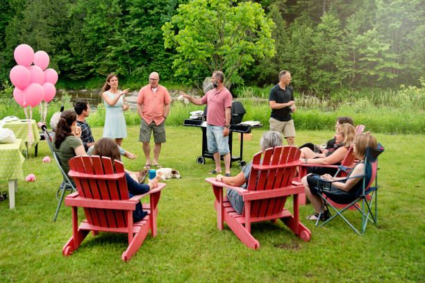 big family at happy hour before bbq, summer outdoors. - garden decoration stock pictures, royalty-free photos & images