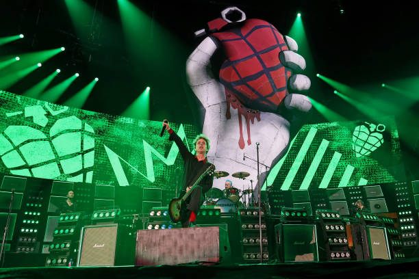 Billie Joe Armstrong and Tré Cool of Green Day perform onstage as Green Day kicks off their Saviors North America Stadium Tour at Nationals Park on...