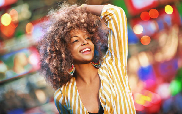black woman dancing at a concert. - concert stock pictures, royalty-free photos & images