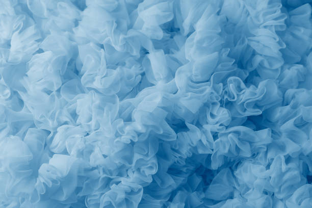 blue lightweight fabric mesh, texture of the fabric, beautifully draped background. - fashion stock pictures, royalty-free photos & images