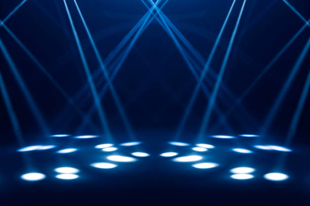 blue stage under concert lighting - concert stock pictures, royalty-free photos & images