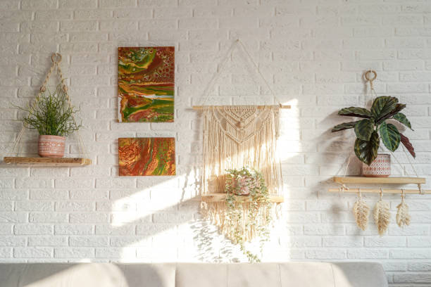 bohemian living room interior, white brick wall. sunny day. - home decoration stock pictures, royalty-free photos & images